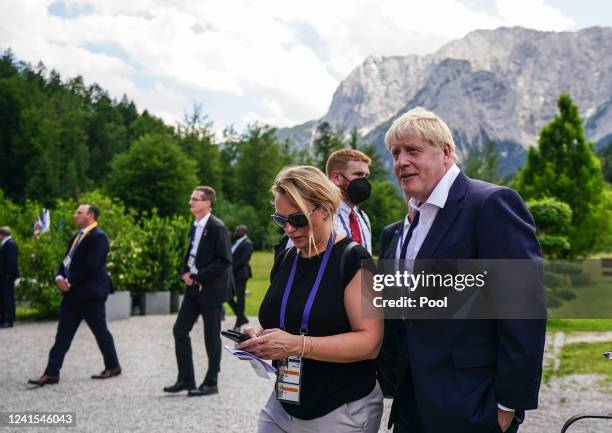 Britain's Prime Minster Boris Johnson walks after a group photo on the first day of the G7 summit at Schloss Elmau on June 26, 2022 near...