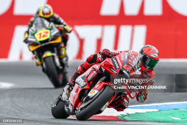 Ducati's Italian rider Francesco Bagnaia leads Ducati's Mooney VR46 Italian rider Marco Bezzecchi during the Dutch MotoGP at the TT circuit of Assen...