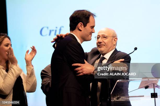 Newly-elected president of the Representative Council of Jewish Institutions in France Yonathan Arfi is congratulated by former CRIF president former...