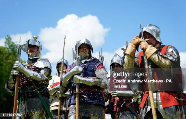 War of the Roses era re-enactors wait to enter the arena to give a demonstration during the Chalke Valley History festival at Broad Chalke, Near...