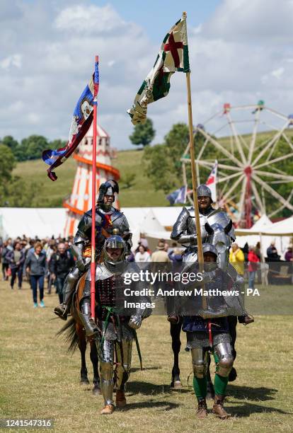 War of the Roses era re-enactors, including one playing the role of King Richard III, make their way to the arena to give a demonstration during the...