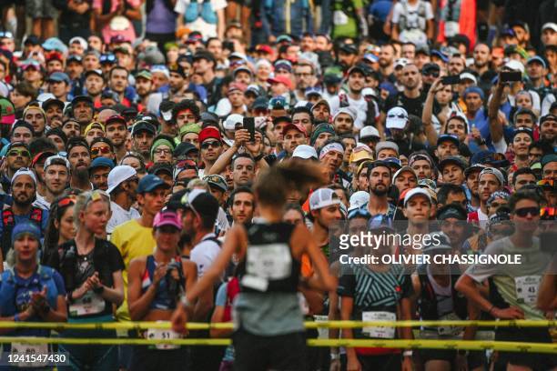 Runners wait at the start line to begin the 42kms Mont Blanc marathon in Chamonix, south-eastern France on June 26, 2022.