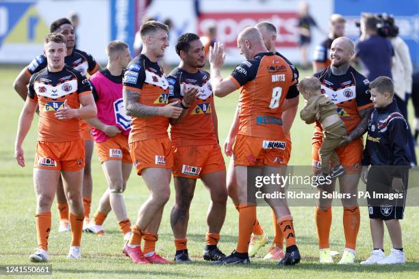 Castleford Tigers players celebrate after the final whistle in the Betfred Super League match at the Mend-A-Hose Jungle, Castleford. Picture date:...
