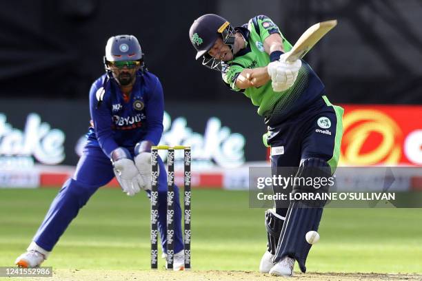 Ireland's George Dockrell plays a shot during the Twenty20 International cricket match between Ireland and India at Malahide cricket club, in Dublin...
