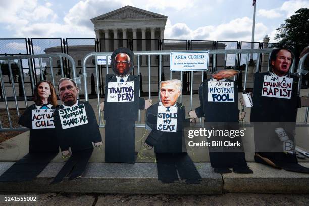 Cardboard cutouts of the conservative Supreme Court justices were propped up by pro-choice activists in front of the Supreme Court before the Dobbs v...