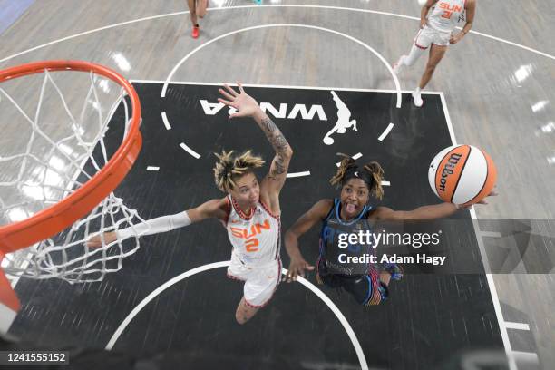 Aari McDonald of the Atlanta Dream drives to the basket during the game against the Connecticut Sun on June 26, 2022 at Gateway Center Arena in...