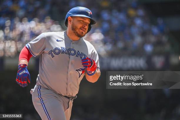 Toronto Blue Jays catcher Alejandro Kirk rounds the bases after hitting a three-run home run during the first inning of a game between the Milwaukee...