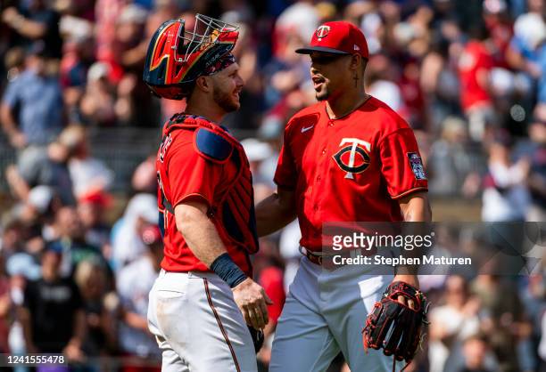 Ryan Jeffers and Jhoan Duran of the Minnesota Twins greet each other after the game against the Colorado Rockies at Target Field on June 26, 2022 in...