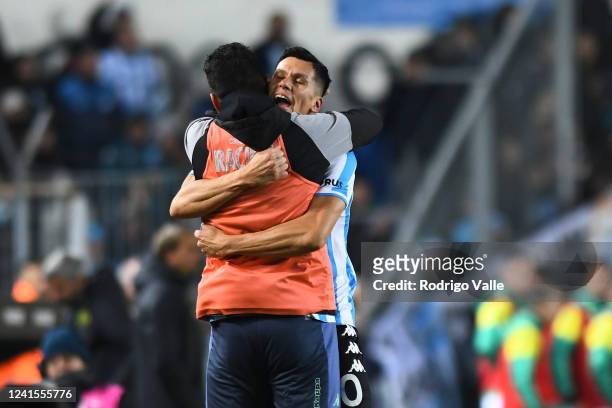 Leonardo Sigali of Racing Club celebrates with teammate Nery Dominguez after scoring the third goal of his team during a match between Racing Club...