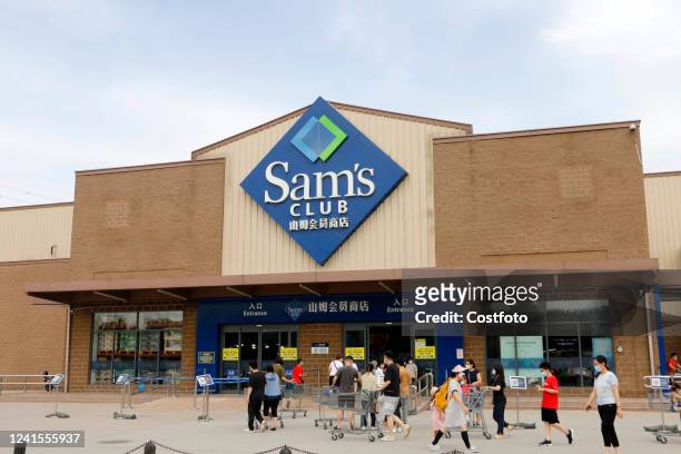 Customers shop at a Sam's Club store in Beijing, China, June 25, 2022.