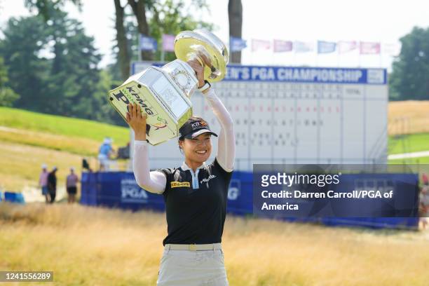 In Gee Chun of the Republic of Korea poses with the KPMG trophy after the final round for the 2022 KPMG Women's PGA Championship at Congressional...