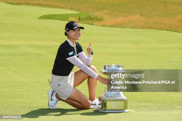 In Gee Chun of the Republic of Korea poses with the KPMG trophy after the final round for the 2022 KPMG Women's PGA Championship at Congressional...