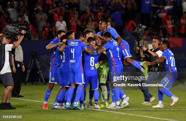 Goalkeeper Sebsatian Jurado of Cruz Azul celebrates with his teammates after defeating Atlas on penalty kicks at the Campeon de Campeones 2022 soccer...