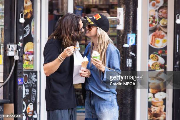 Heidi Klum and Tom Kaulitz seen out in Soho on June 26, 2022 in New York City.