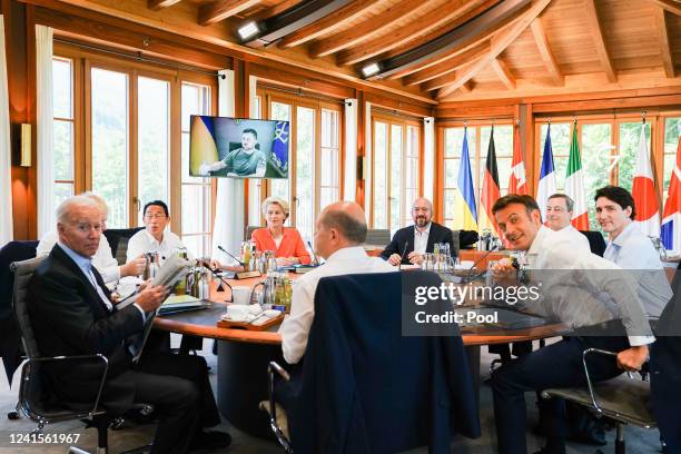 Ukrainian President Volodymyr Zelensky gives a speech via video link to G7 leaders US President Joe Biden, Japanese Prime Minister Fumio Kishida,...