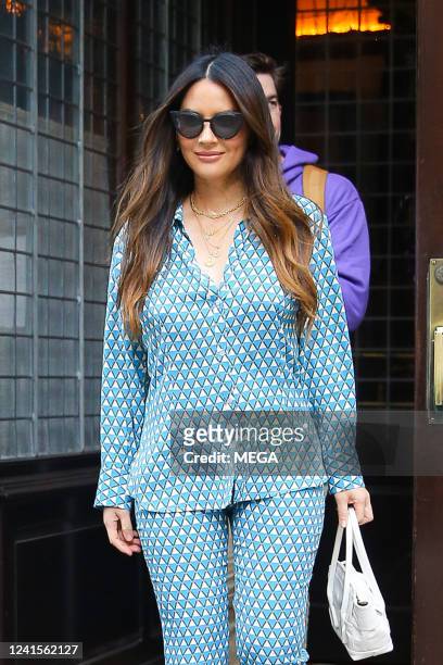 Olivia Munn seen leaving their hotel with John Mulaney on June 25, 2022 in New York City.