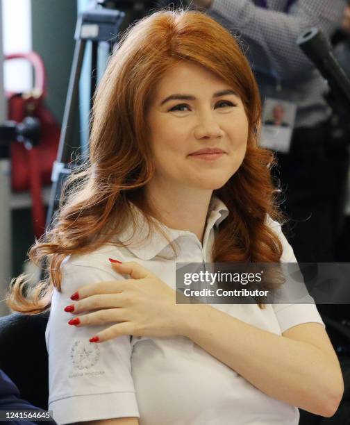 Russian Foreign Intelligence Service SVR RF agent Anna Chapman smiles during the opening of the "Profession is foreigner" Exhibition, dedicated to...