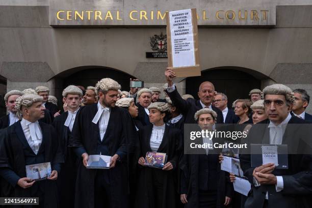 Defence barristers take part in a strike outside the Central Criminal Court, also known as the Old Bailey, on June 27, 2022 in London, United...