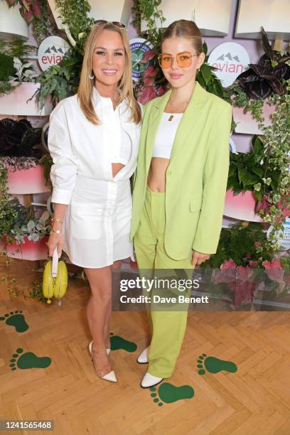 Amanda Holden and Lexi Hughes attend the evian VIP Suite, certified as carbon neutral by The Carbon Trust, at Wimbledon on June 27, 2022 in London,...