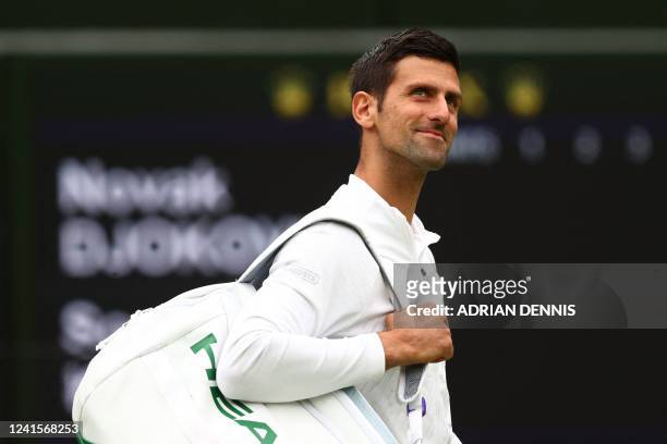 Serbia's Novak Djokovic arrives at Court 1 to play against South Korea's Kwon Soon-woo during their men's singles tennis match on the first day of...