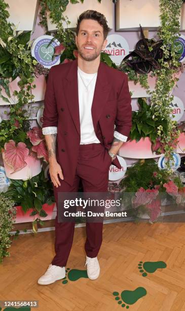 Joel Dommett attends the evian VIP Suite, certified as carbon neutral by The Carbon Trust, at Wimbledon on June 27, 2022 in London, England.