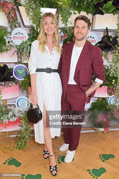Hannah Cooper and Joel Dommett attend the evian VIP Suite, certified as carbon neutral by The Carbon Trust, at Wimbledon on June 27, 2022 in London,...