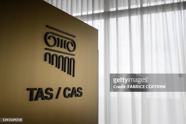 Sign of the Court of Arbitration of Sport is seen during the inauguration of its new headquarters in Lausanne on June 27, 2022. - The ceremony marked...