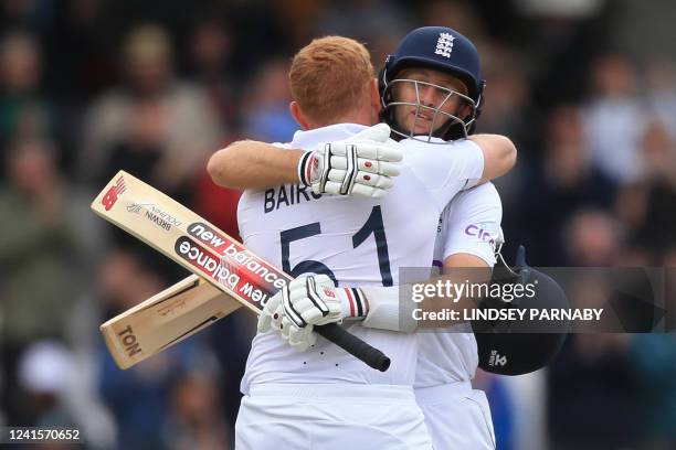 England's Jonny Bairstow and England's Joe Root celebrate their win on day 5 of the third cricket Test match between England and New Zealand at...