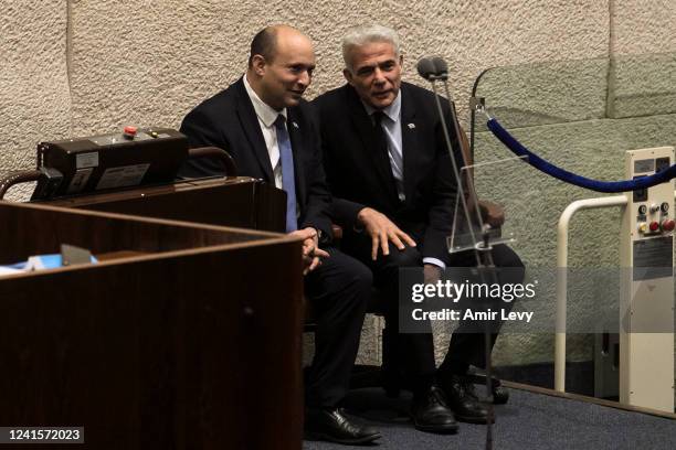 Israeli Prime Minister, Naftali Bennet and Minister of Foreign Affairs, Yair Lapid attend an Israeli parliament meeting on June 27, 2022 in...