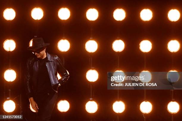 French designer Hedi Slimane acknowledges the audience at the end of the Celine fashion show during the Menswear Ready-to-wear Spring-Summer 2023...