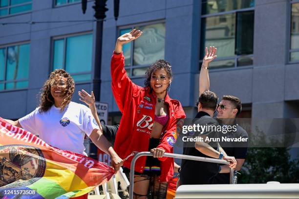 Bud Light model waves to crowd during the 52nd annual San Francisco Pride Parade on June 26, 2022 in San Francisco, California. Thousands of people...