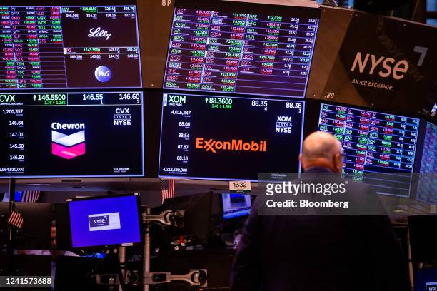 Chevron Corp. And Exxon Mobil Corp. Signage on the floor of the New York Stock Exchange in New York, U.S., on Monday, June 27, 2022. Money managers...