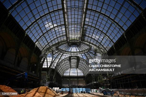 This picture shows a general view of the under-restoration Grand Palais and its glass nave in Paris on June 27, 2022.