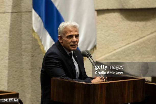 Israeli Minister of Foreign Affairs, Yair Lapid speaks during an Israeli parliament meeting on June 27, 2022 in Jerusalem, Israel. The dissolution of...