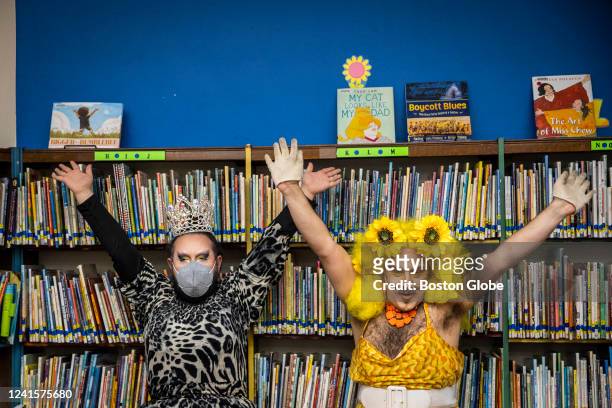 Chelsea, MA Drag queens Just JP, left, and Sham Payne read stories to children during a Drag Story Hour at Chelsea Public Library in Chelsea, MA on...