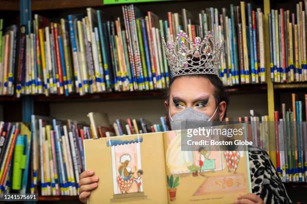 Chelsea, MA Drag queen Just JP reads stories to children during a Drag Story Hour at Chelsea Public Library in Chelsea, MA on June 25, 2022. In the...
