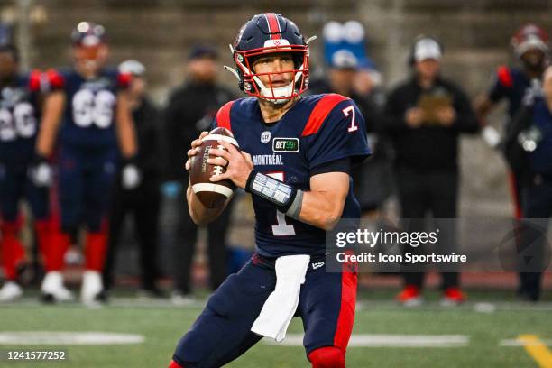 Montreal Alouettes quarterback Trevor Harris plays the ball during the Saskatchewan Roughriders versus the Montreal Alouettes game on June 23 at...