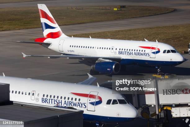 British Airways aircrafts are seen at London Heathrow Airport. Hundreds of the flag carriers ground staff have voted to strike next month over a 10%...