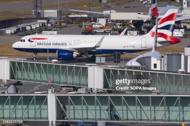 British Airways aircraft is seen at London Heathrow Airport. Hundreds of the flag carriers ground staff have voted to strike next month over a 10%...