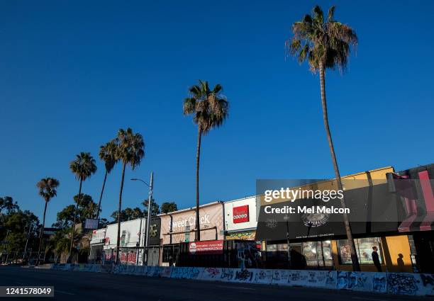 Pedestrian walks past storefronts on Fairfax Ave. Between Melrose Ave. And Beverly Blvd., the real-life setting that inspired Amazons animated series...