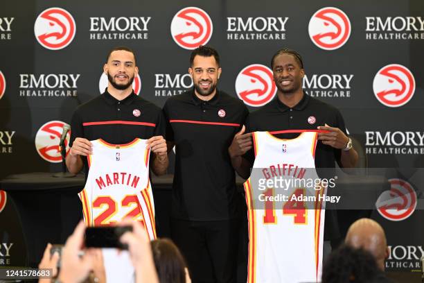 Griffin, Landry Fields, and Tyrese Martin of the Atlanta Hawks pose for a photo during the Atlanta Hawks Draft Press Conference on June 27, 2022 at...