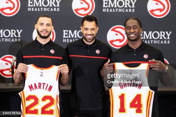 Griffin, Landry Fields, and Tyrese Martin of the Atlanta Hawks pose for a photo during the Atlanta Hawks Draft Press Conference on June 27, 2022 at...