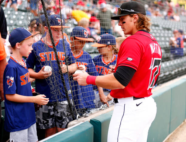 Indianapolis Indians infielder Mason Martin signs an autograph for a young fan prior to a MiLB game between the Memphis Redbirds and the Indianapolis...