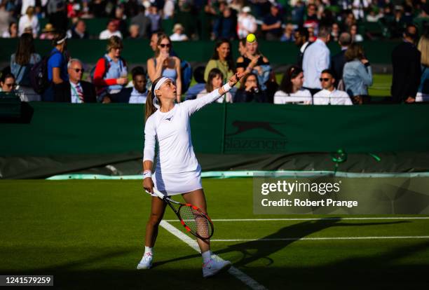 Aleksandra Krunic of Serbia in action against Sorana Cirstea of Romania in her first round match during Day One of The Championships Wimbledon 2022...