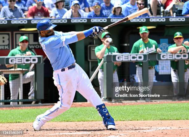 Kansas City Royals first baseman Carlos Santana hits a two-RBI single in the sixth inning during a MLB game between the Oakland Athletics and the...
