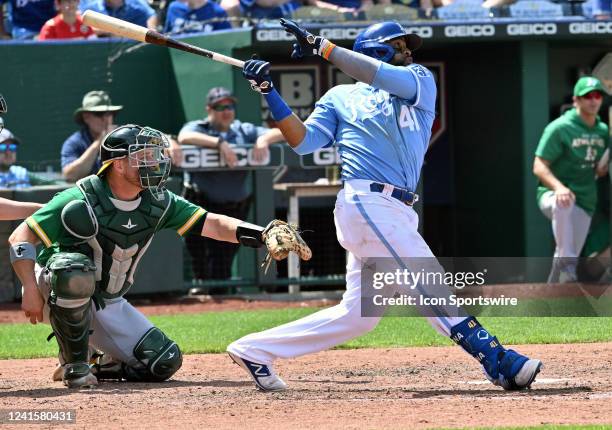 Kansas City Royals first baseman Carlos Santana doubles in the ninth inning during a MLB game between the Oakland Athletics and the Kansas City...