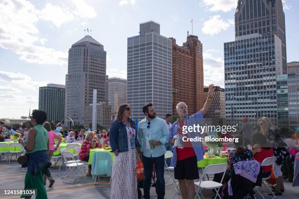Attendees during a rooftop party before the Ford Motors Fireworks show in Detroit, Michigan, US, on Monday, June 27, 2022. The Ford Fireworks...