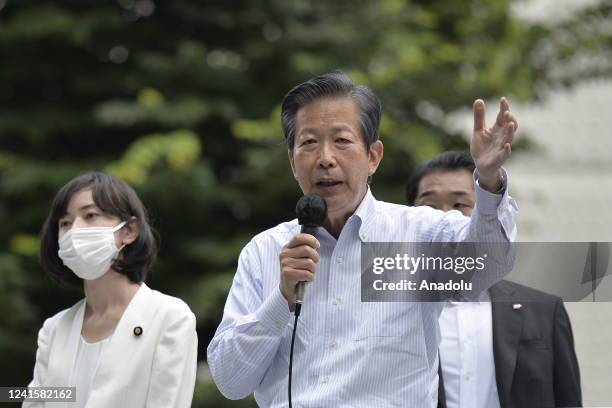 Komeito representative Natsuo Yamaguchi, ruling coalition party, delivers a speech as he attends a street meeting with a Komeito's candidate, Miura...