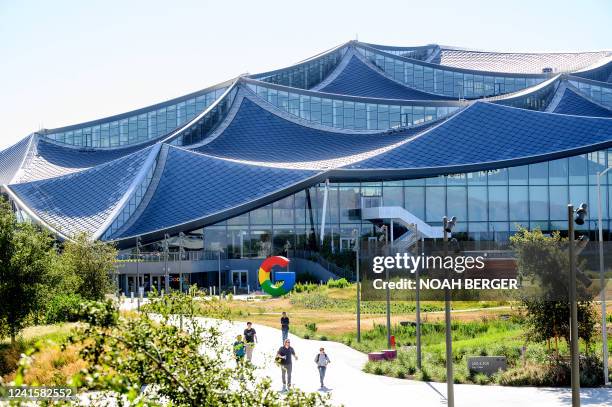 Workers leave Google's Bay View campus in Mountain View, California on June 27, 2022.
