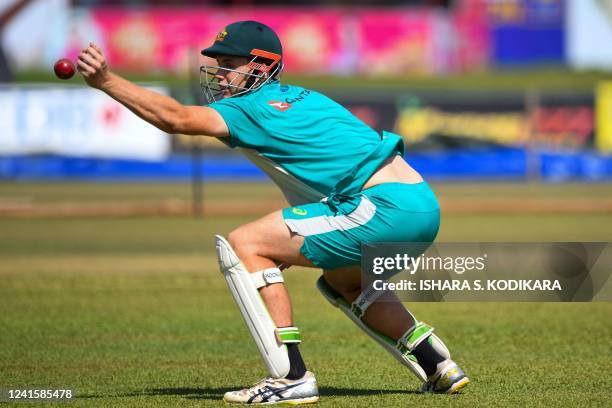 Australia's Cameron Green tries to field a ball during a practice session at the Galle International Cricket Stadium in Galle on June 28 ahead of...